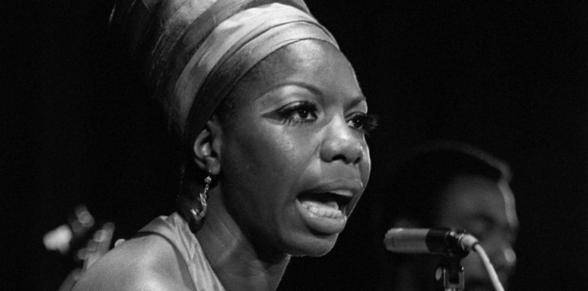 Nina Simone performing on stage
