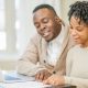 black couple discussing finances